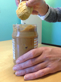 Mango Dipped in Peanut Butter Gif