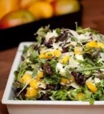 Quick-Pickled Mangos with Tender Greens and Goat Cheese