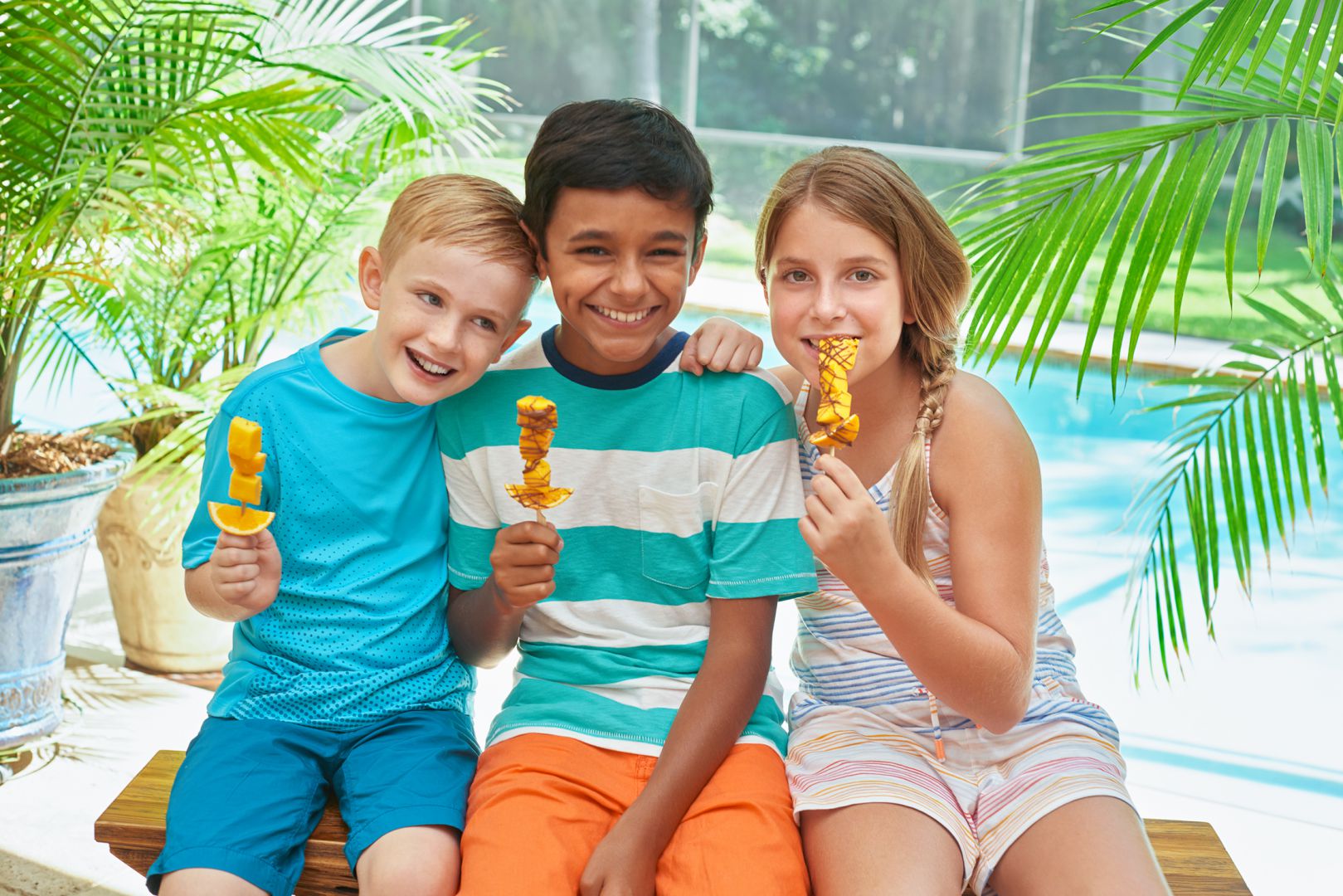 Children enjoying Mango Snack