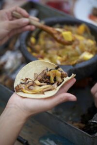 Woman Making Mango Fajita Tacos